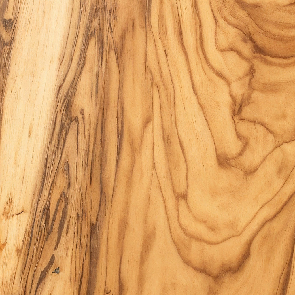 Tabla de corte de olivo Meberant — detalle macro del grano